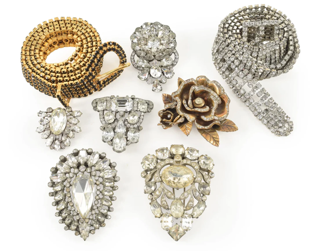 Lot of vintage rhinestone jewelry. To include: 6 fur pins (5 by Eisenberg)