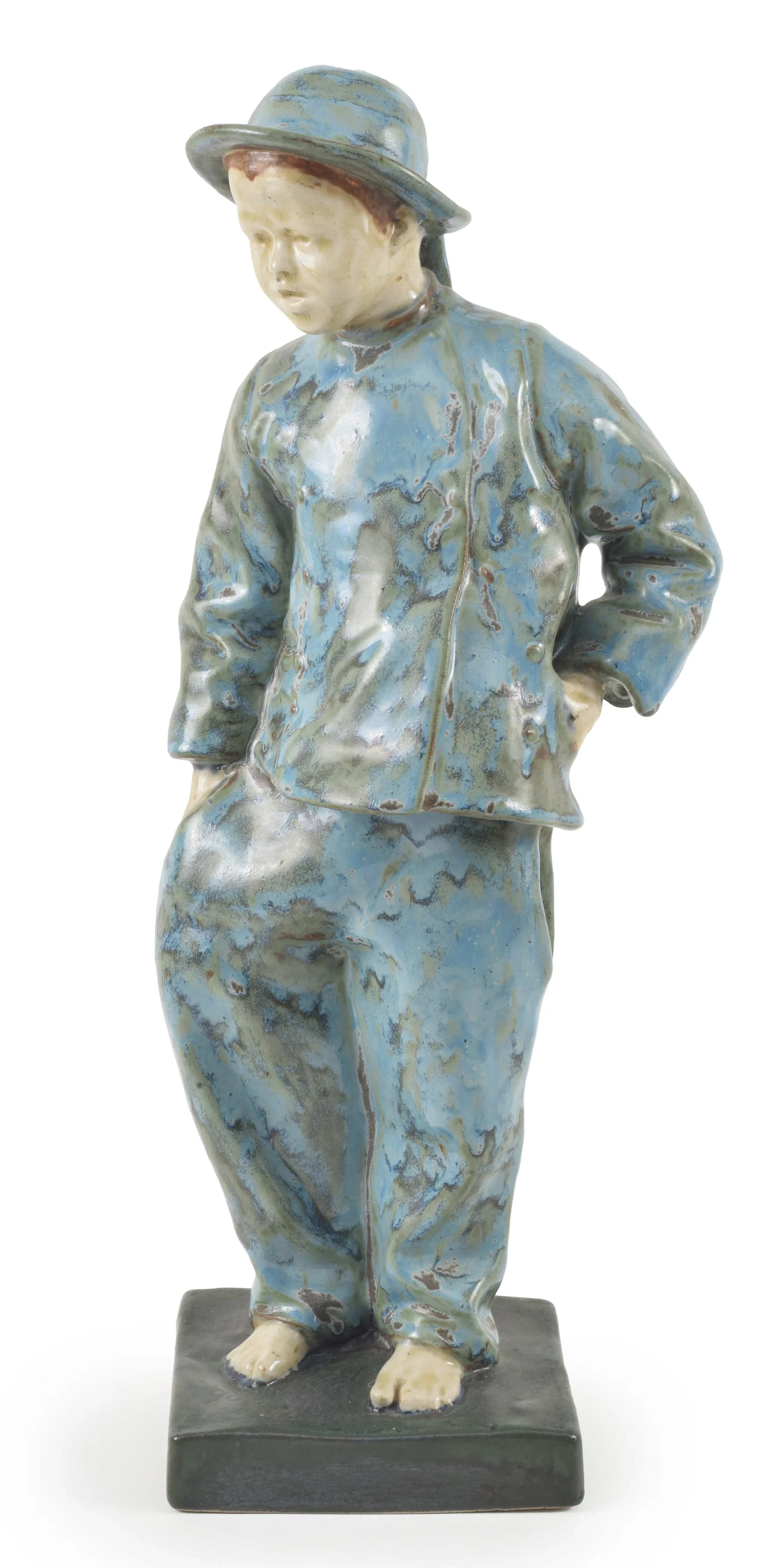 Rene Quillivic Quimper glazed ceramic figure, early 20th century.