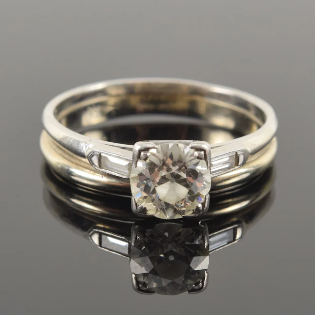 Vintage 14K gold and platinum diamond solitaire engagement ring and