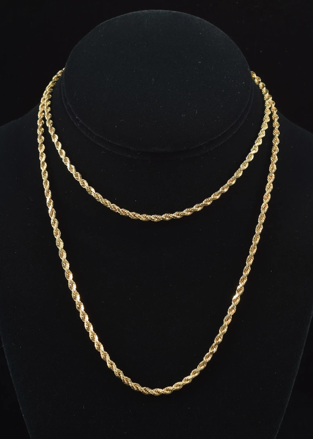 14K gold rope twist necklace. Clasp marked 14K. 30in length. 25.1 grams.
