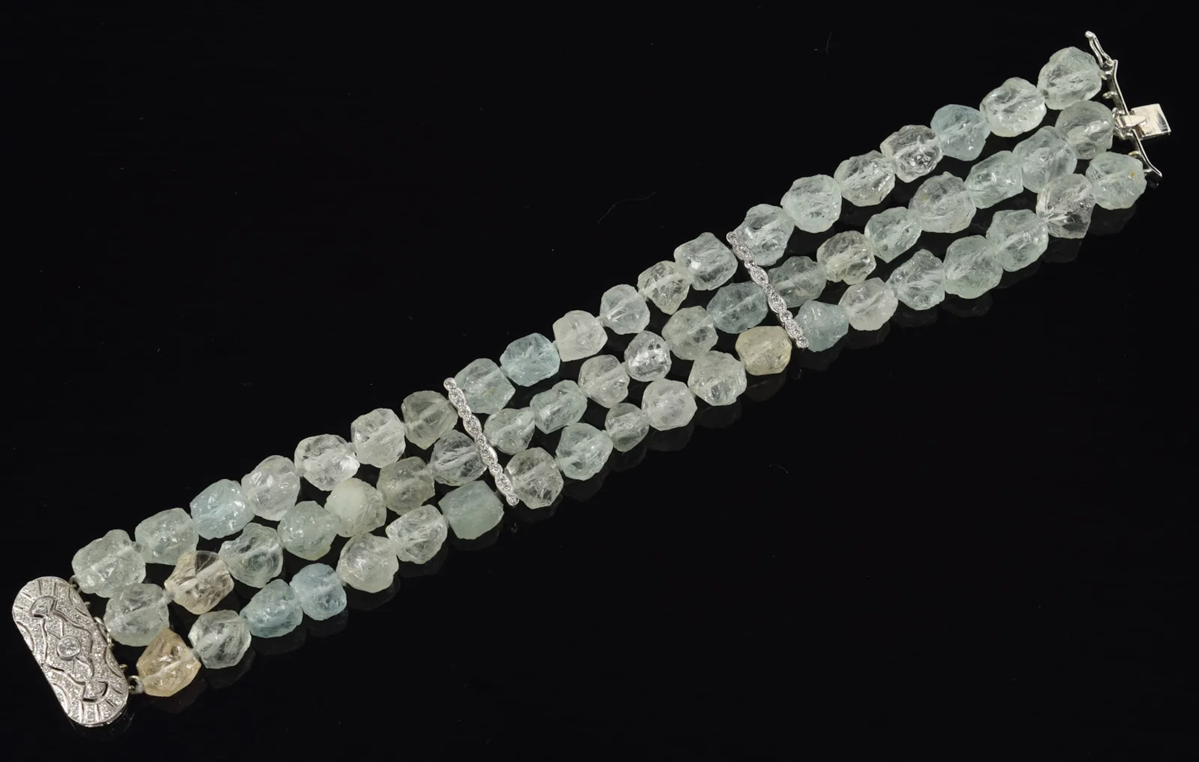 14K white gold rough cut aquamarine and diamond bracelet. 3 strands