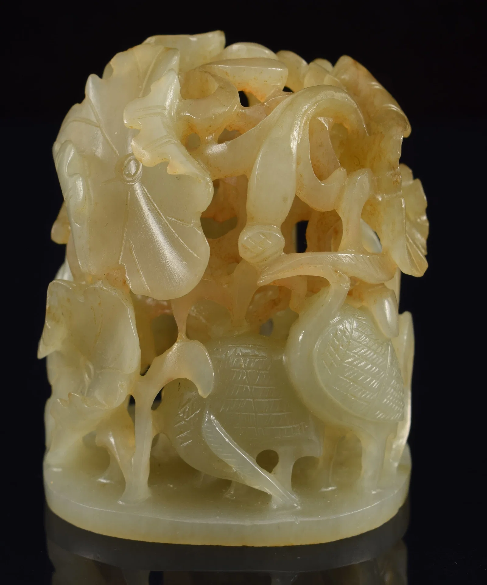 Jade finial. China. Yuan period. Carving of aquatic birds and water