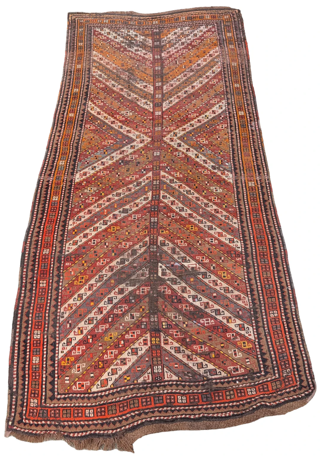 Antique tribal rug, early 20th century. Areas of wear. 107 x 50in.