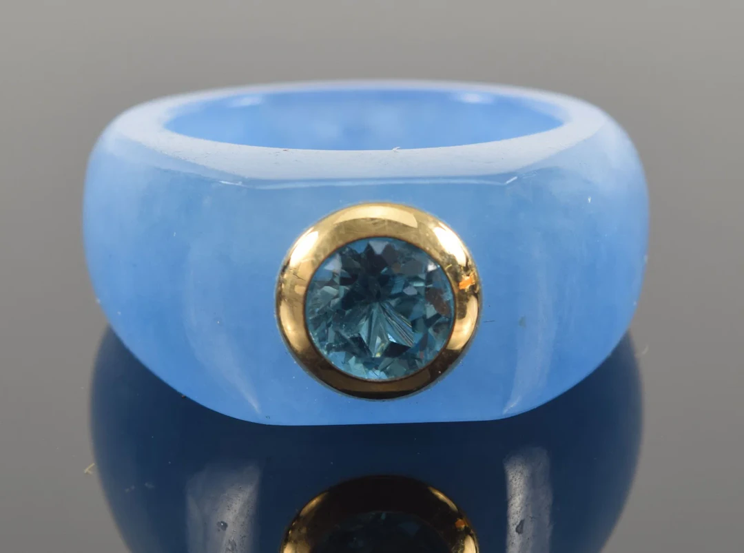Blue jadeite ring with 14K gold and blue zircon stone. Zircon measures