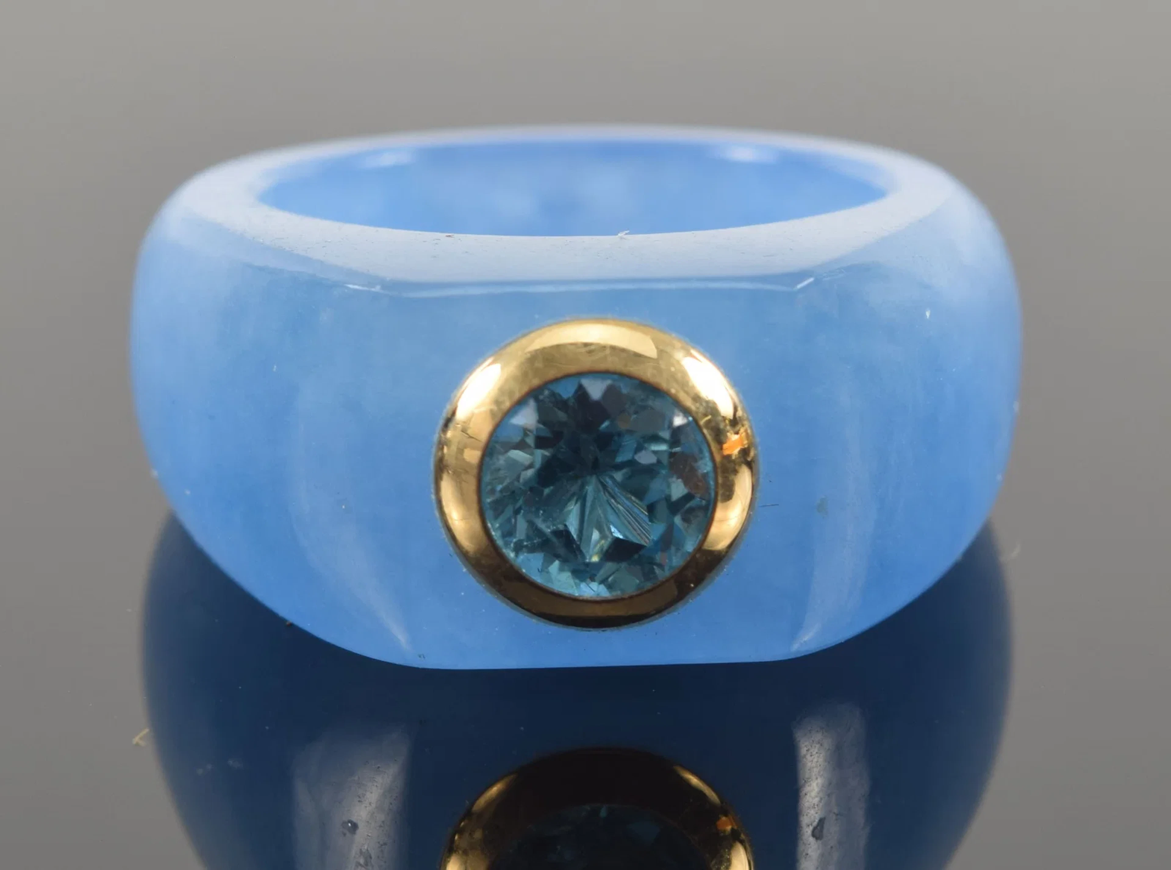 Blue jadeite ring with 14K gold and blue zircon stone. Zircon measures