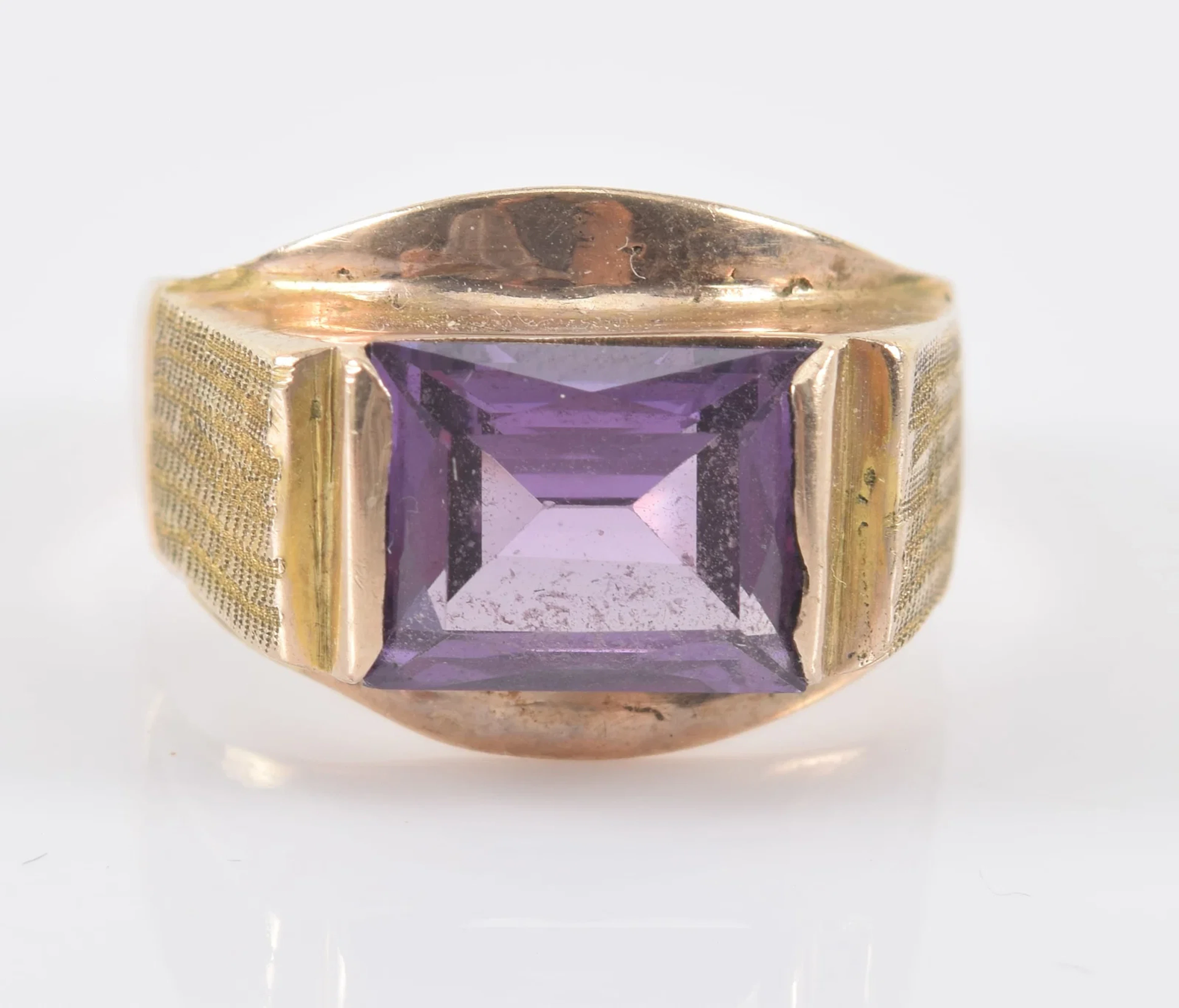 Vintage 14K gold amethyst ring. Rectangular cut amethyst stone measures