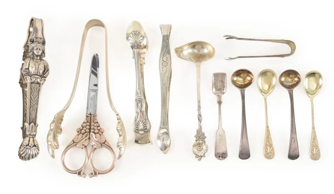 Collection of 13 silver serving items, including sterling 6 sugar