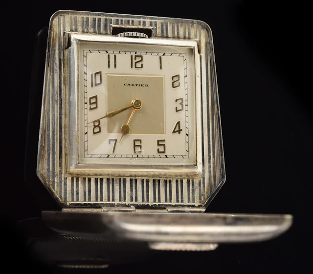 Cartier Art Deco silver cased travel clock. 1.5 x 1.5in. 1.5 ozt.