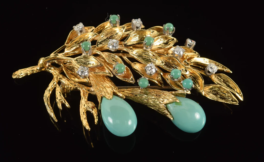 18K gold turquoise and diamond mounted brooch. Branch design with