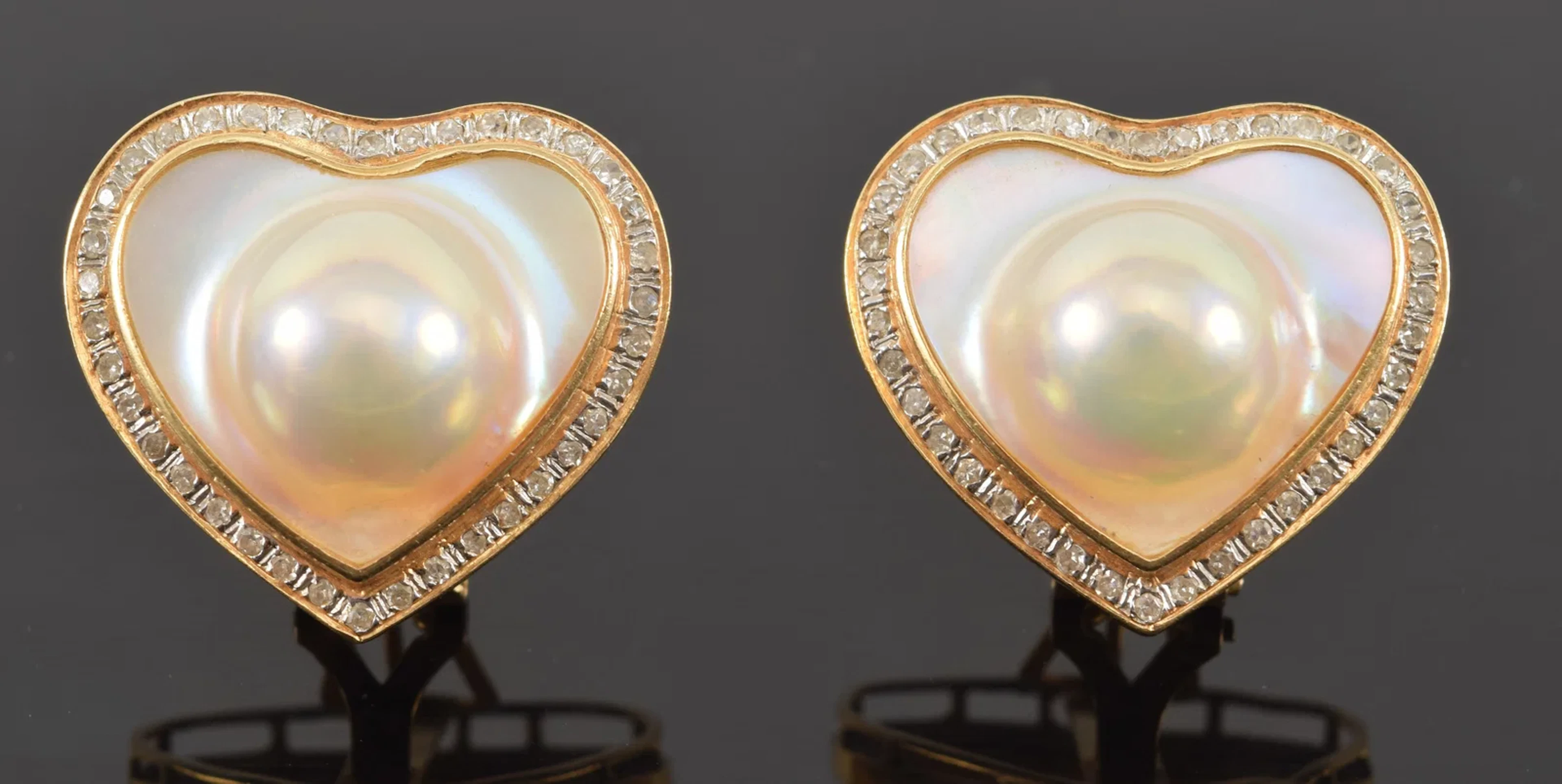 14K gold mabe pearl and diamond heart form earrings. Omega backs.