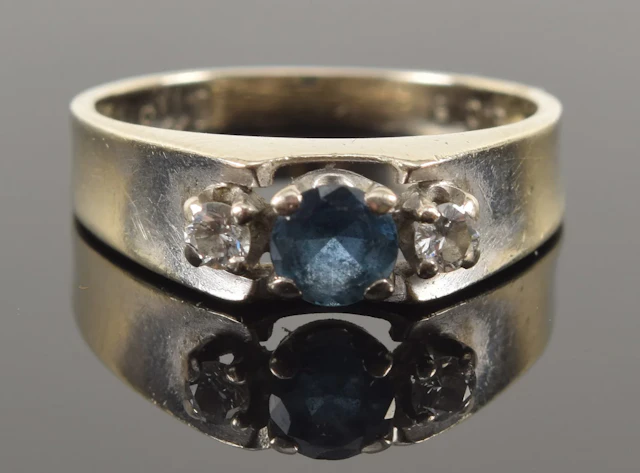 Vintage 14K gold sapphire and diamond ring. Round cut sapphire measures