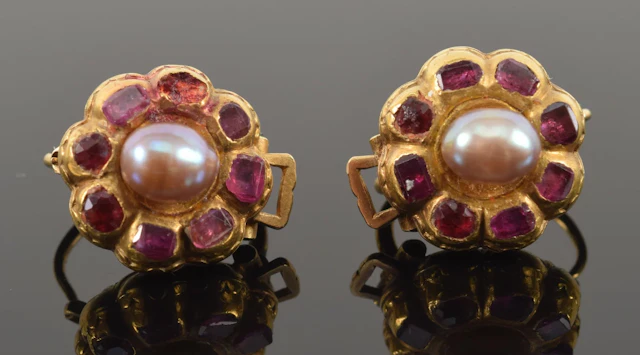 Antique 18K gold ruby and pearl earrings. Each with a central Tahitian