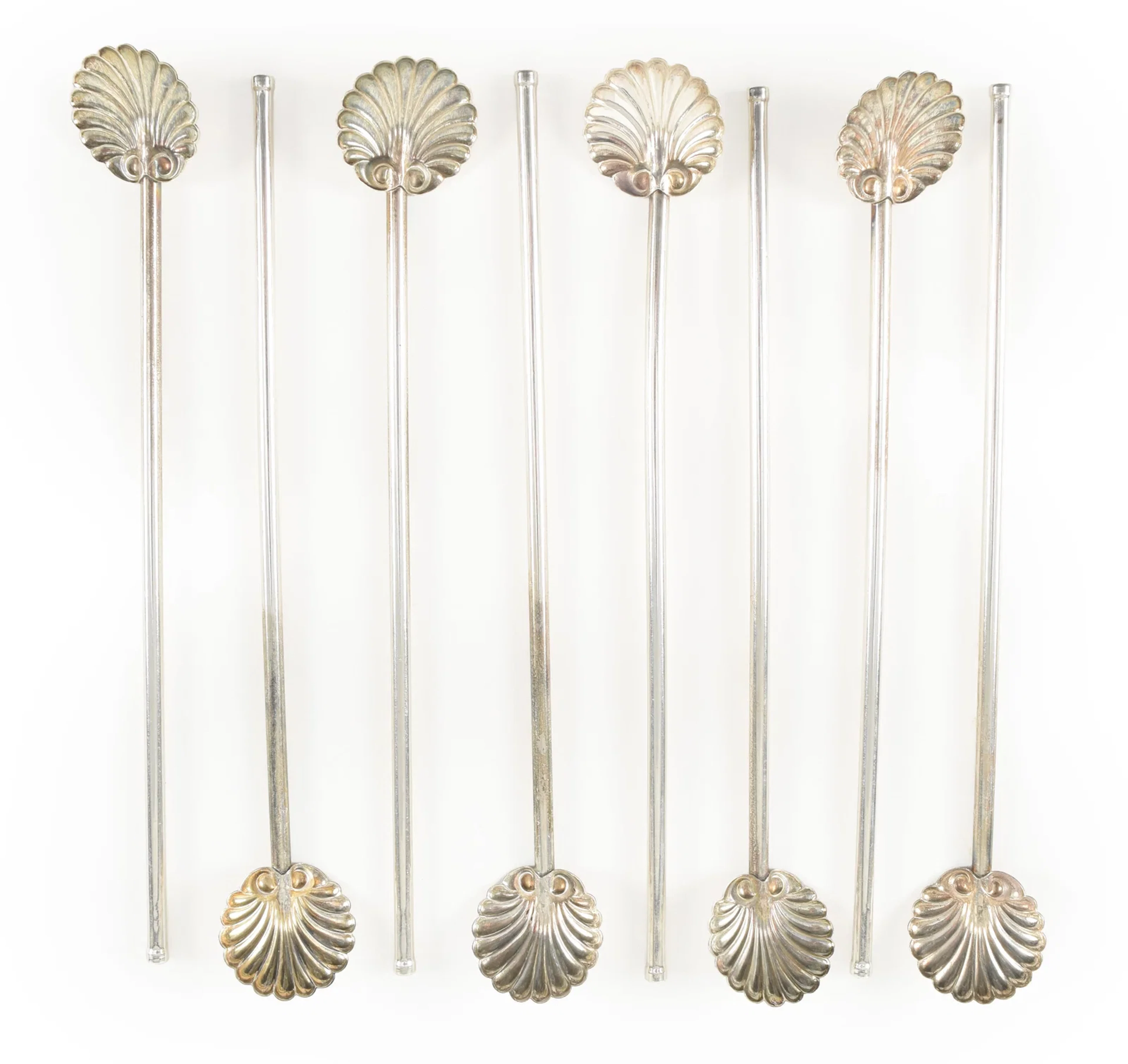 8 Sterling silver shell form sipper stirrers. Length 7.75 in. 2.57 ozt.