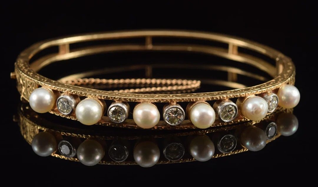 Antique 14K gold diamond and pearl mounted hinged bracelet. 6 pearls