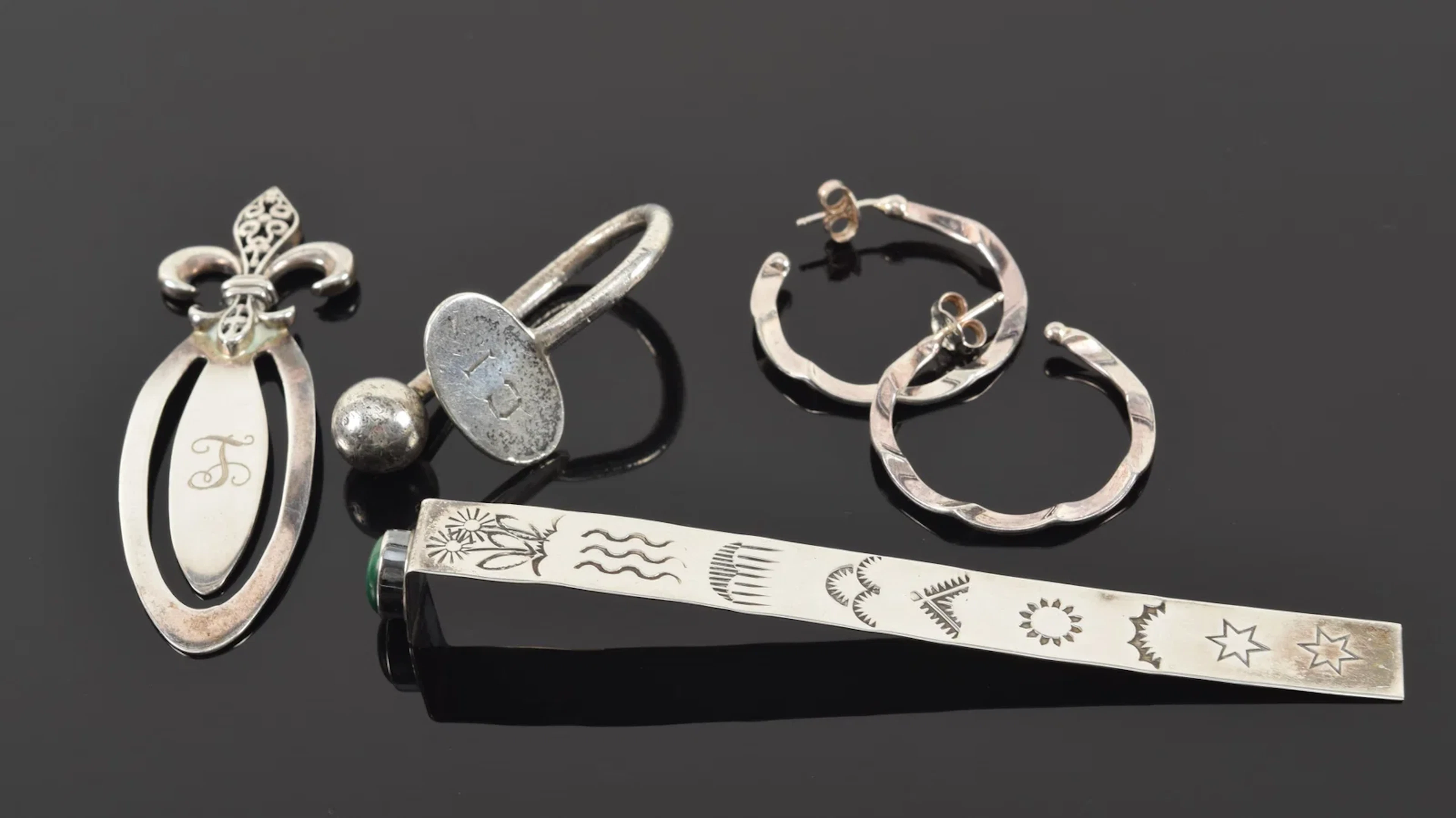 Assorted silver items. To include: Malachite mounted bookmark, fleur