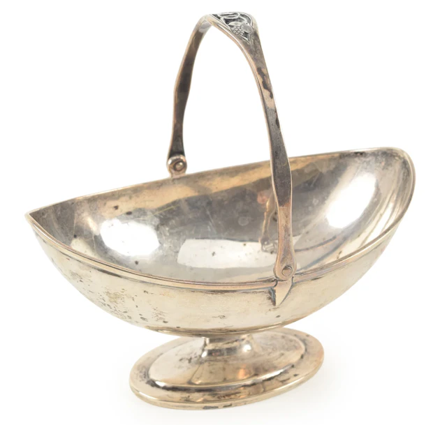 Arthur Stone sterling silver footed handled basket. Handle with reticulated
