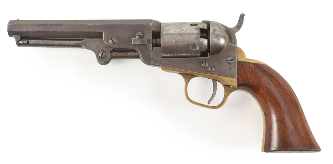 Colt model 1849 pocket .31 caliber revolver with 5" barrel. Manufactured