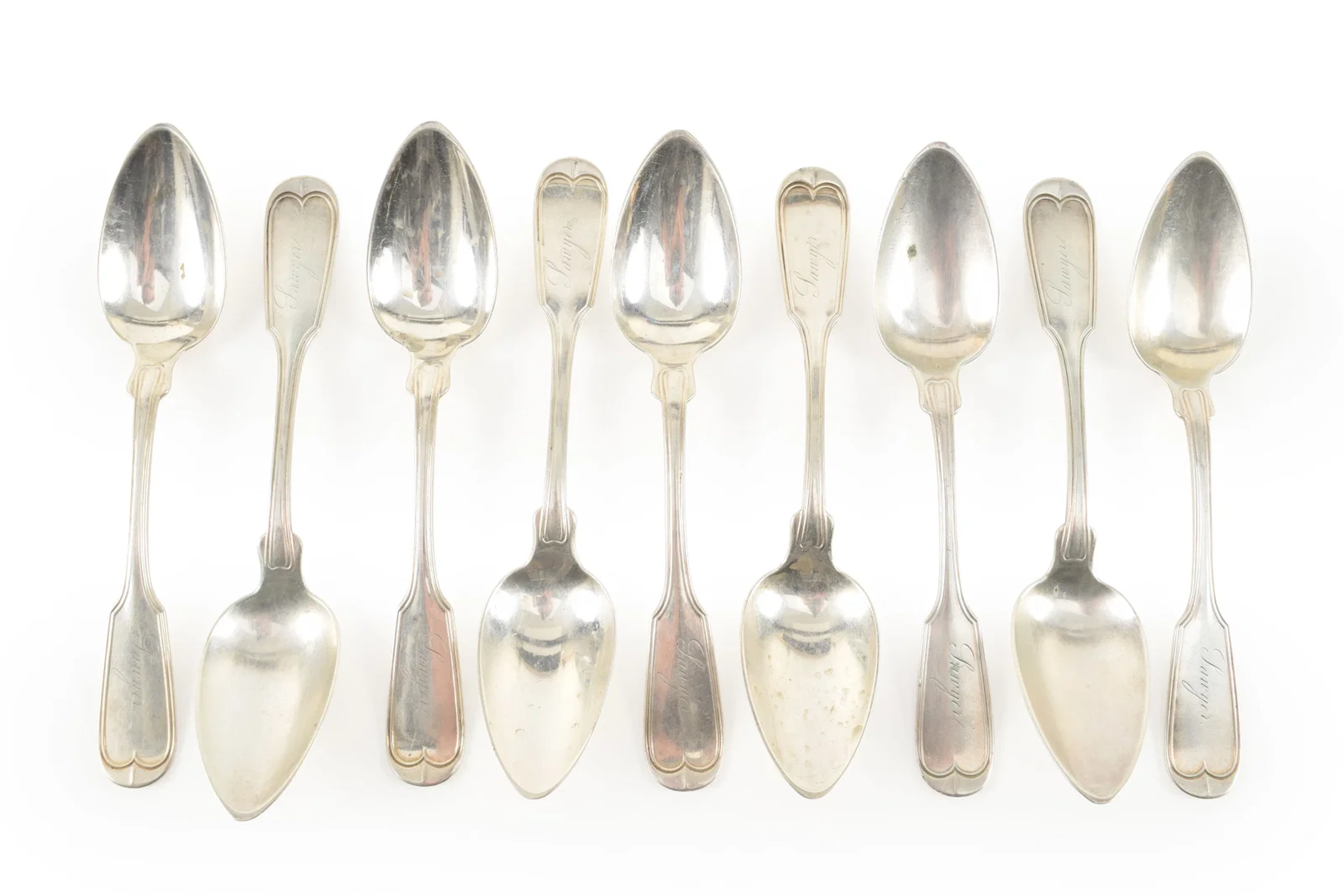 9 Silver teaspoons with fiddle and tread pattern. Length 5.75 in, 7.32 ozt.