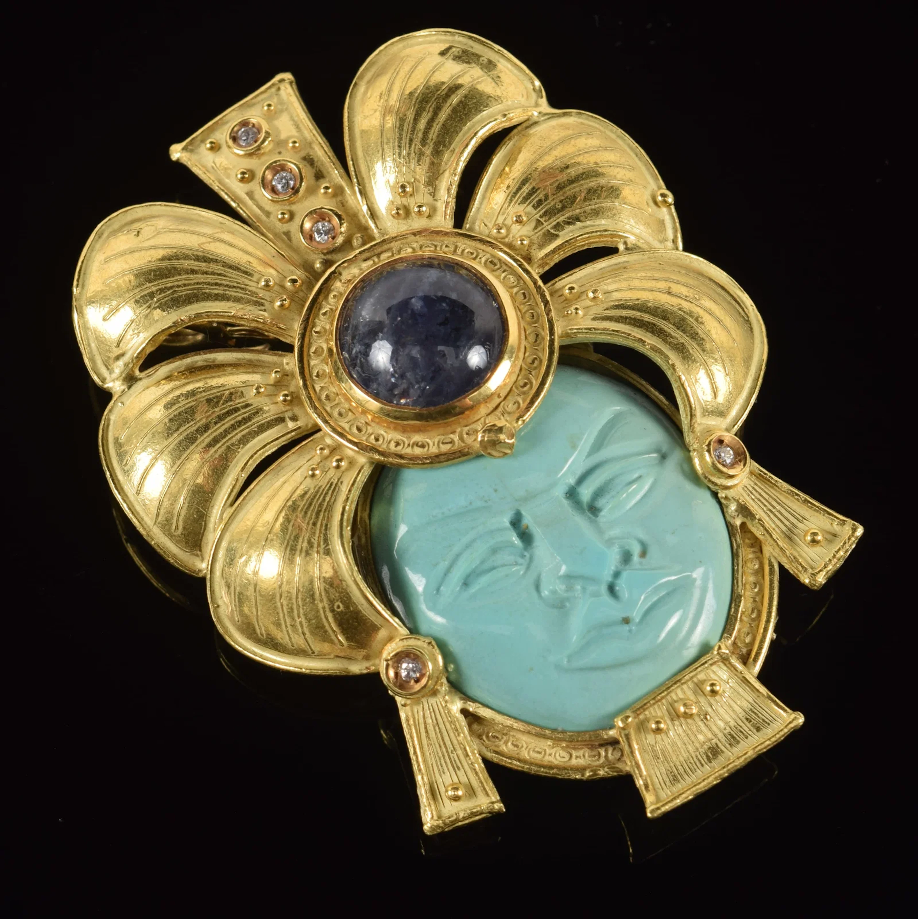 18K gold Mesoamerican mask style brooch/pendant. Carved turquoise