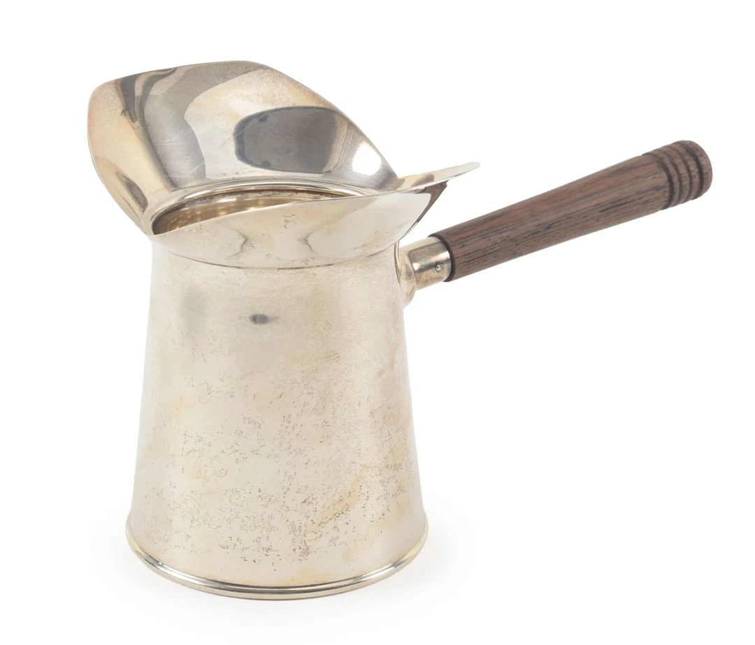 Cartier Sterling silver double spouted brandy warmer with wood handle.