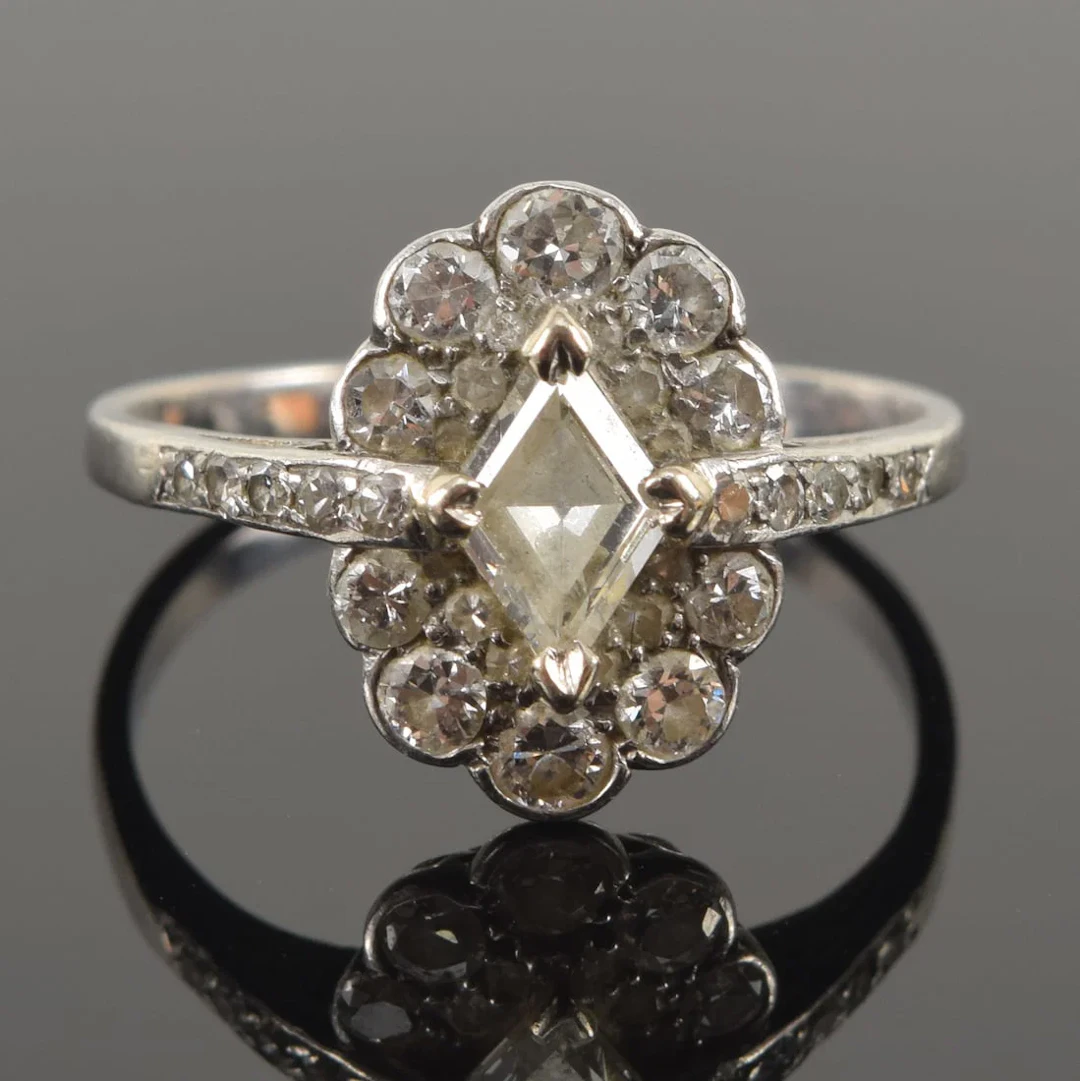 Vintage 18K gold diamond halo ring. Rhomboid shaped center diamond