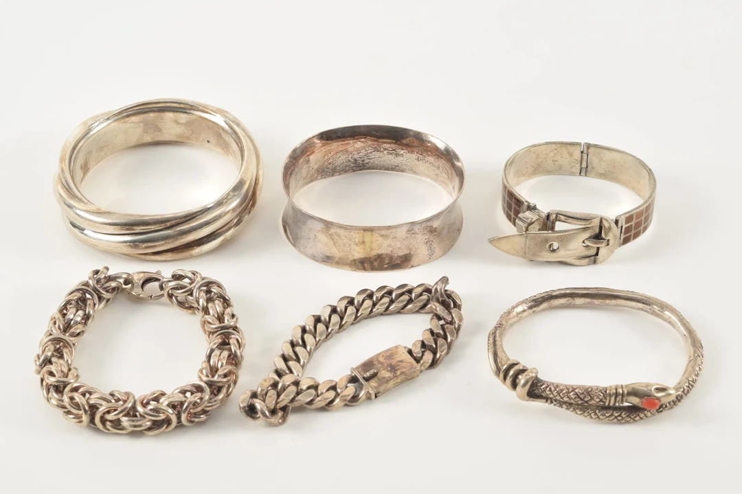 6 sterling silver bracelets. To include: Enamel decorated buckle form