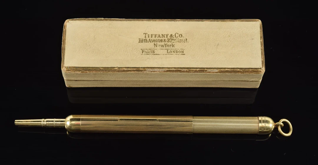 Antique Tiffany & Co. 14K gold mechanical pencil in original box.