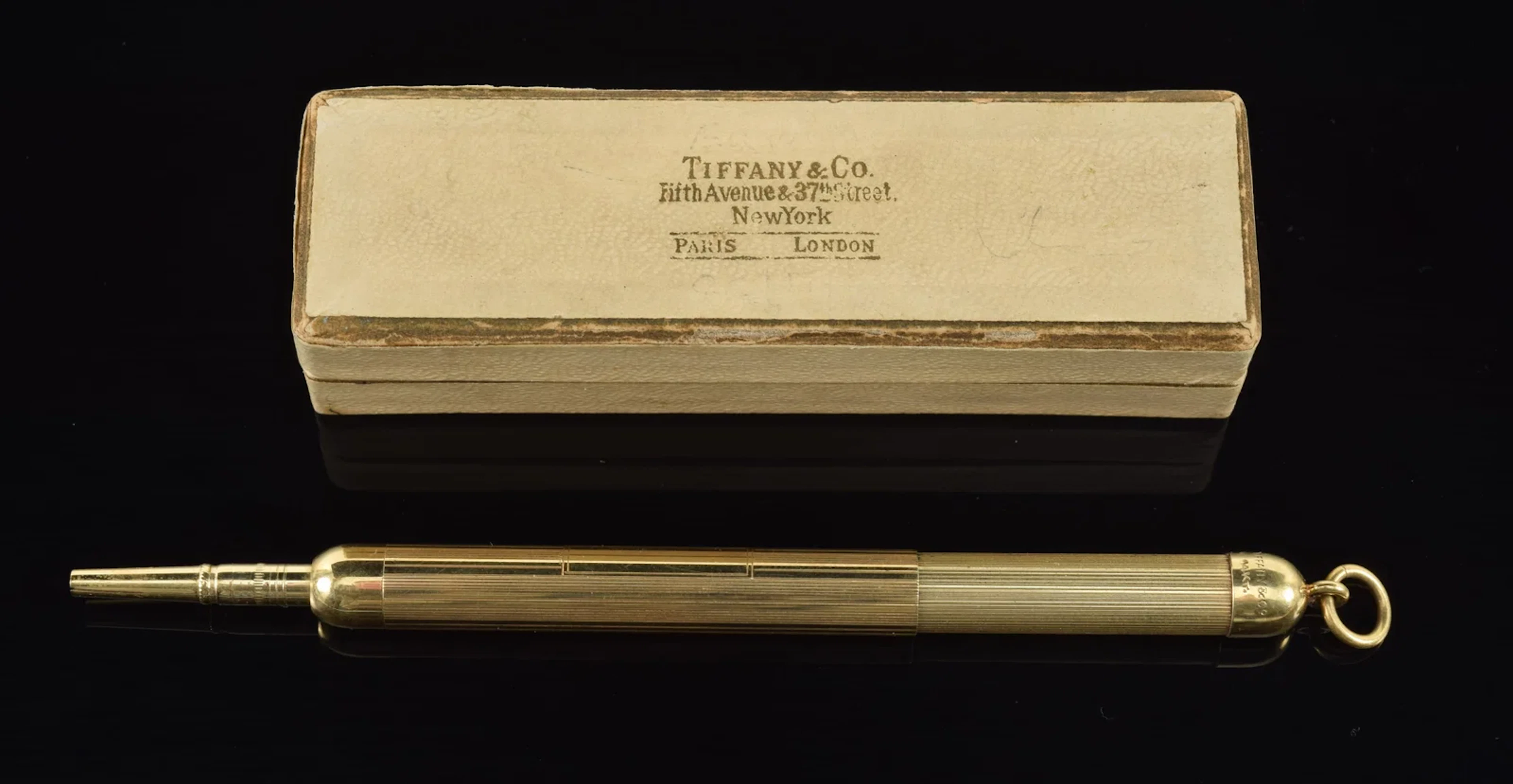 Antique Tiffany & Co. 14K gold mechanical pencil in original box.