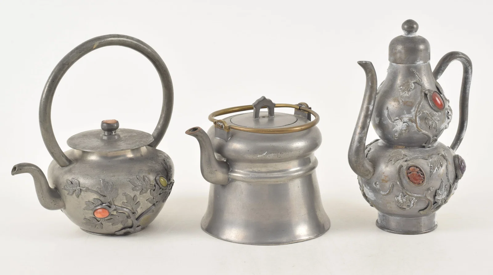 Lot of 3 antique Chinese pewter teapots. 1) Wide brass handled teapot.