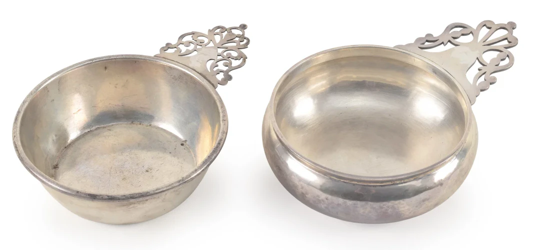 2 Sterling silver reproduction porringers, one Cartier and the other