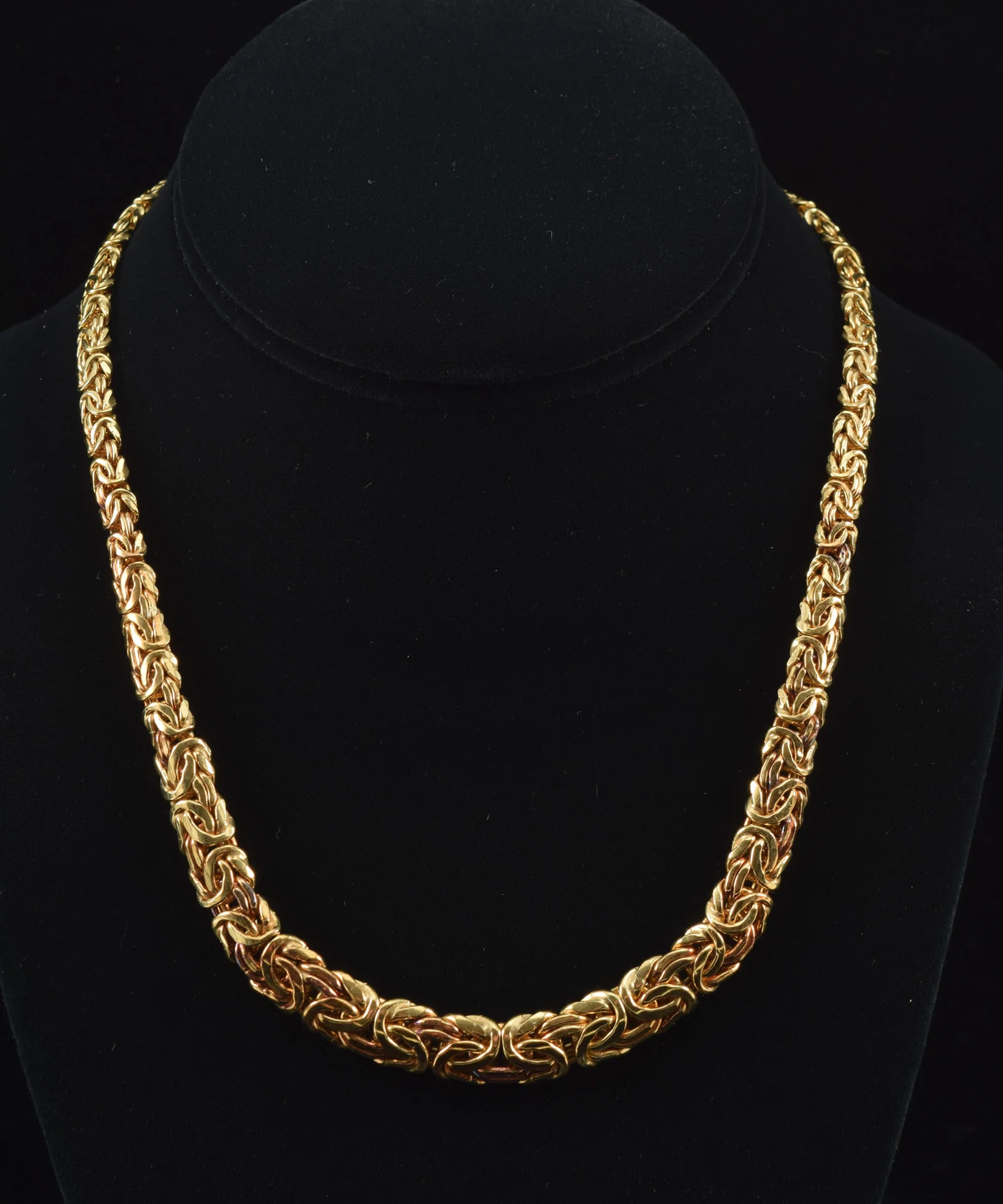 14K gold Byzantine link necklace. Tapered design with domed exterior