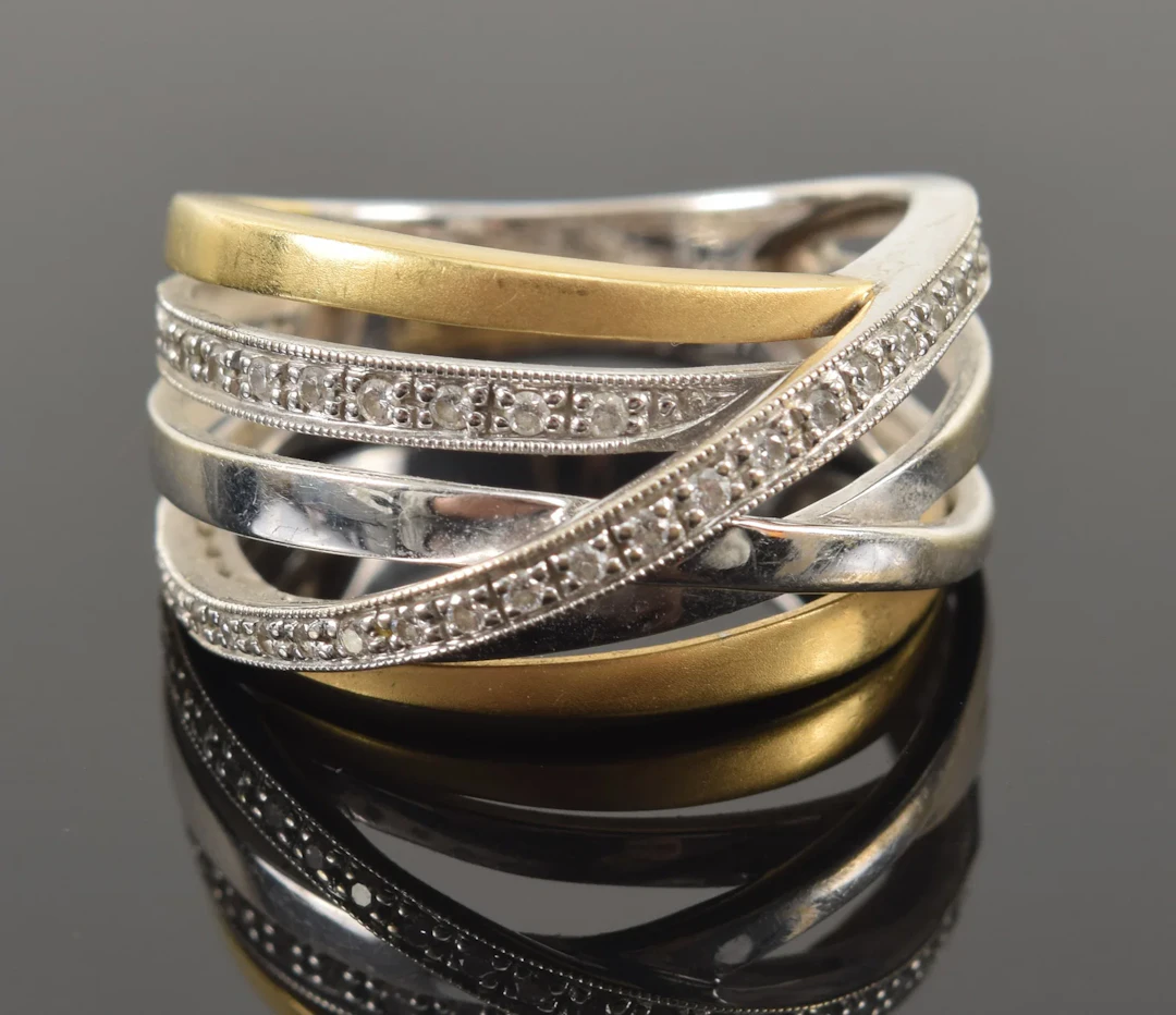 18K gold diamond ring. Yellow and white gold openwork bands, 2 set