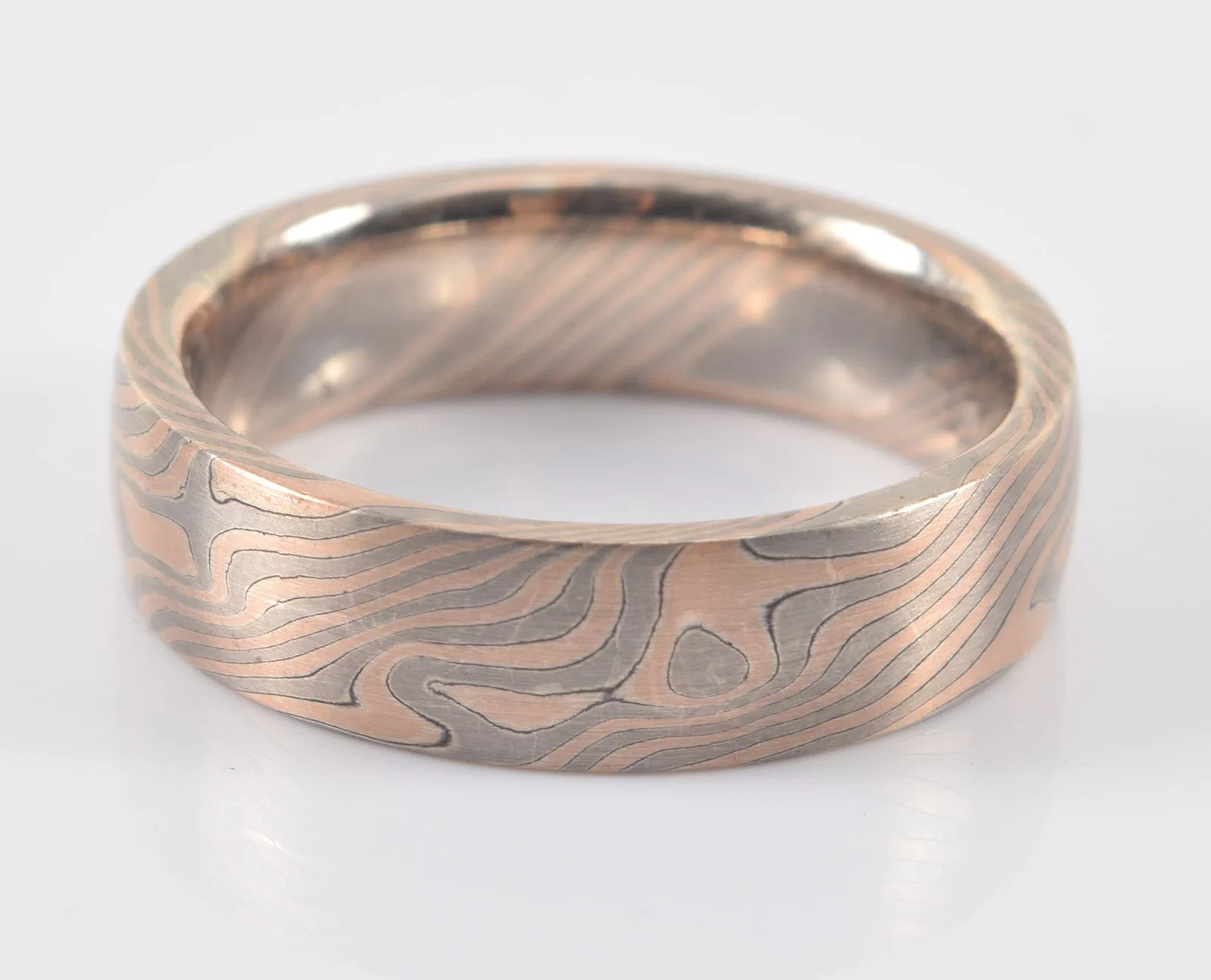 Chris Ploof 18K gold mixed metal mokume gane band. Distinctive gold
