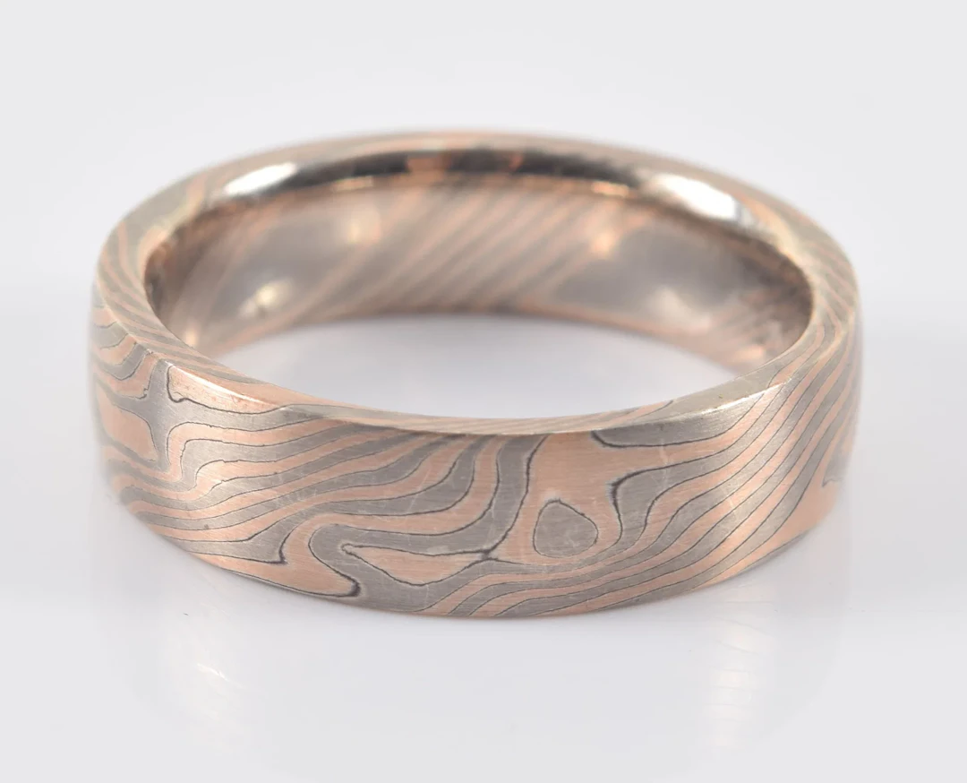 Chris Ploof 18K gold mixed metal mokume gane band. Distinctive gold