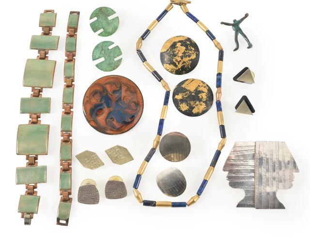 Lot of modern costume jewelry. To include: matching enameled bracelets