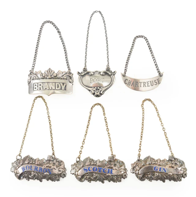 6 Silver liquor bottle lables, including 3 sterling and 3 plated with