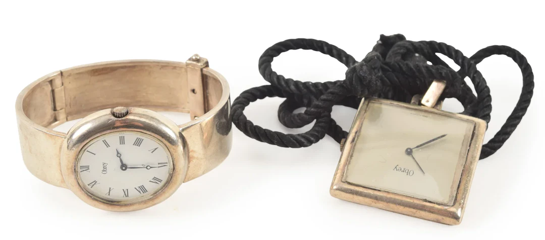 2 Obrey sterling silver watches, including wristwatch and pendant watch.