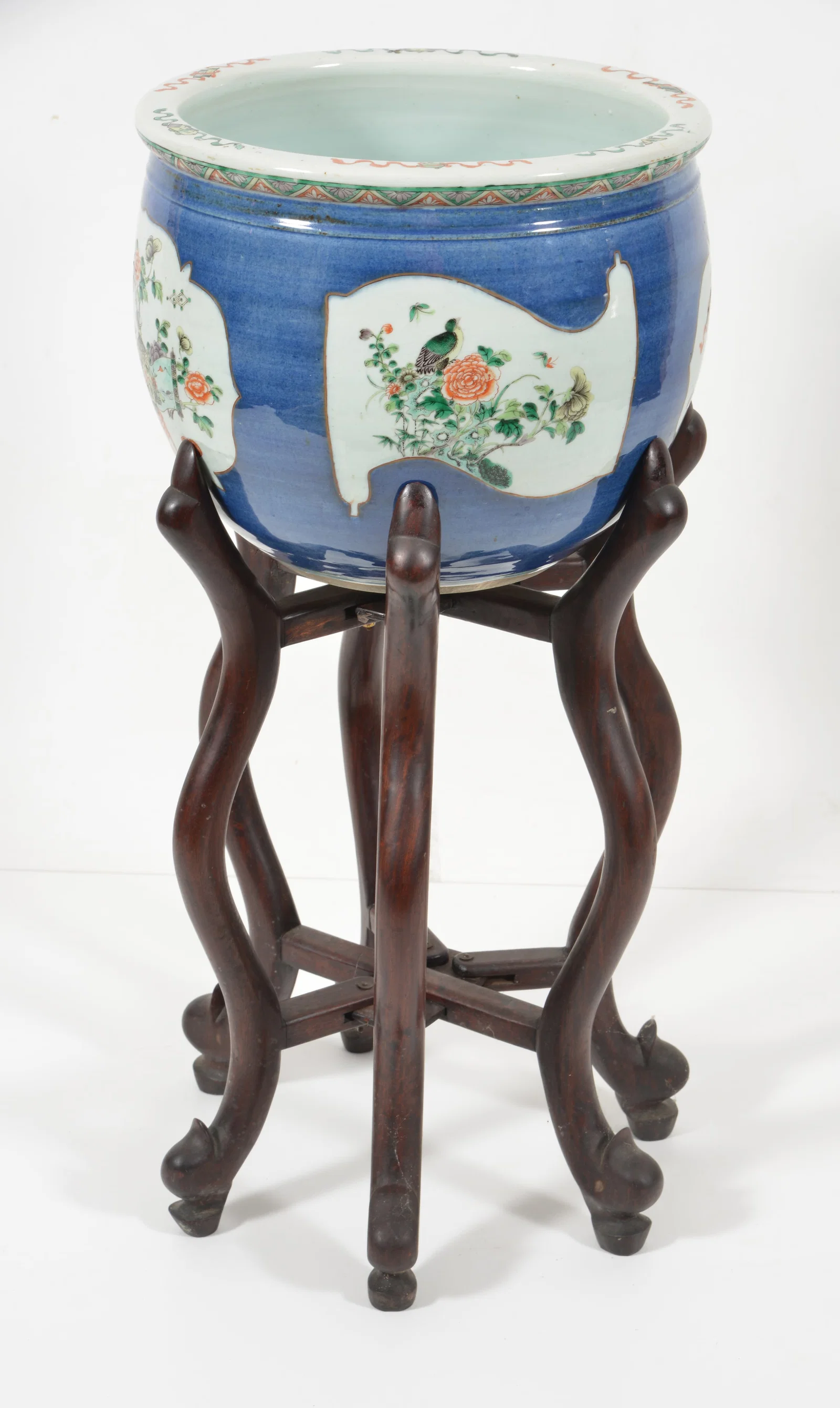 19th century Chinese porcelain planter. Blue ground with motifs of