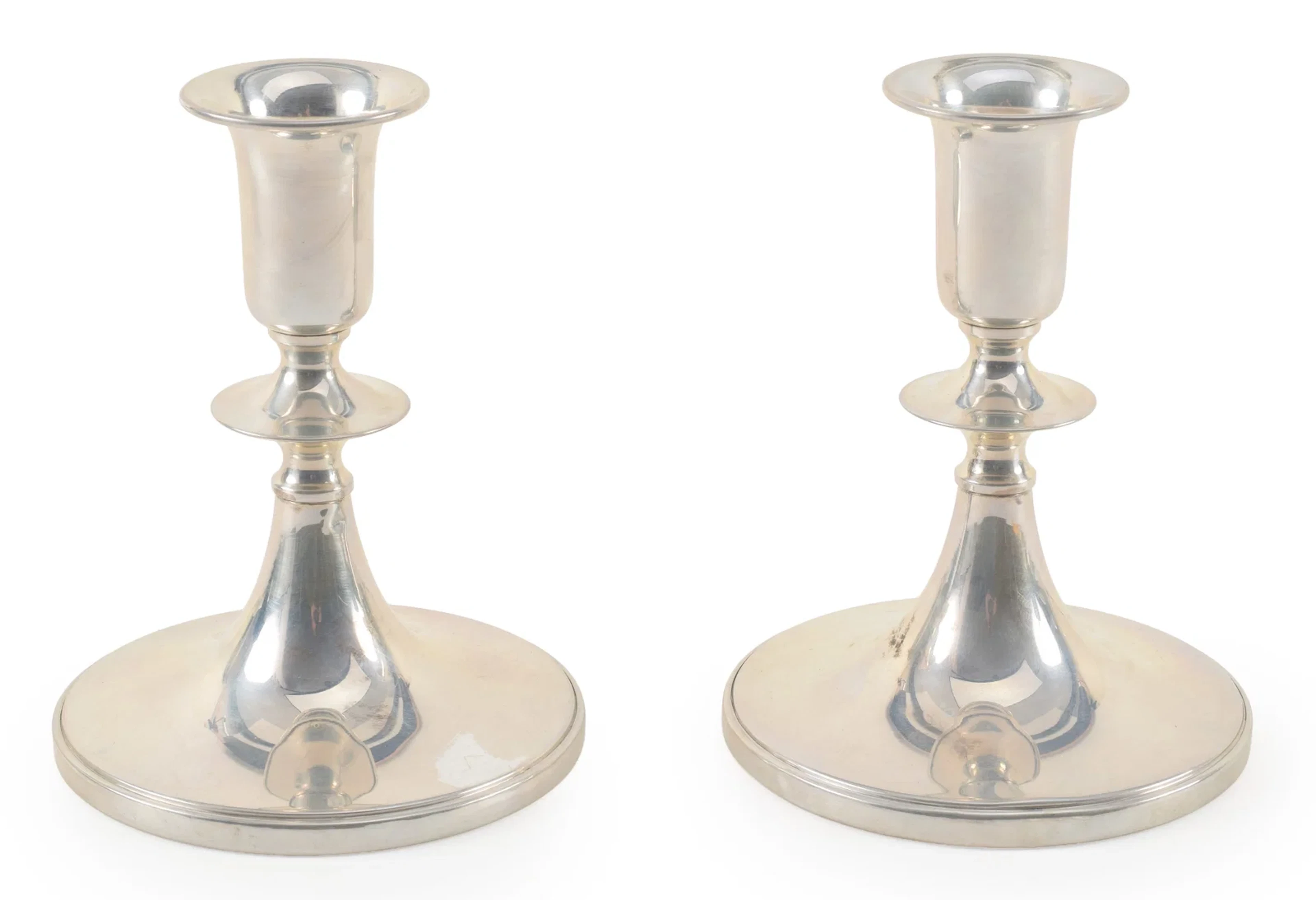 Pair of Sterling silver colonial style weighted candelabra together