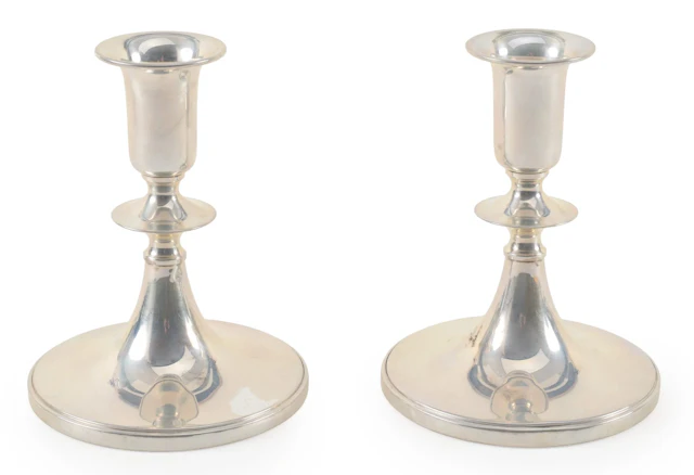 Pair of Sterling silver colonial style weighted candelabra together