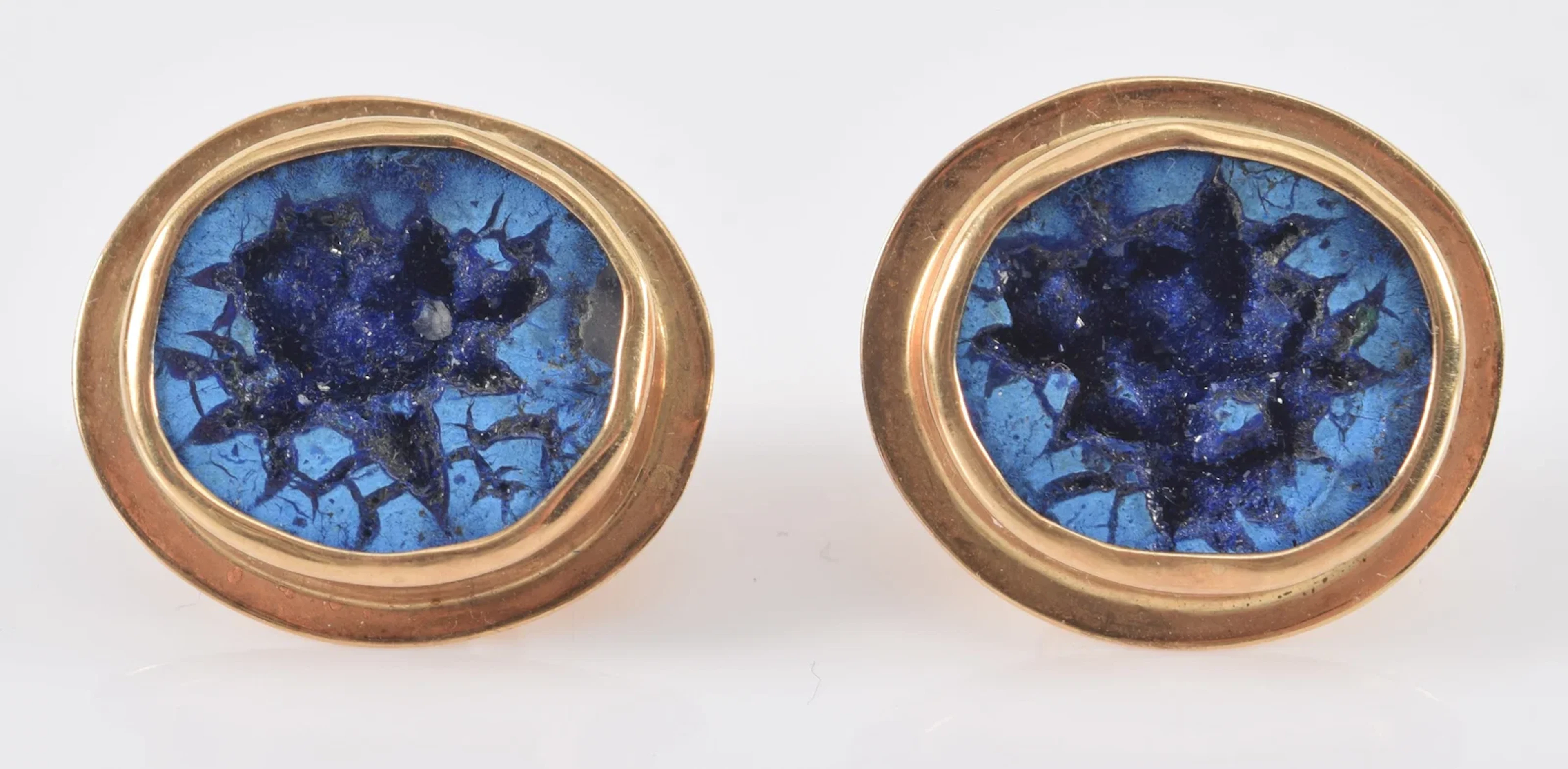 14K gold blue geode mounted earrings. Oval form. Marked 14KT on reverse.