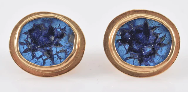 14K gold blue geode mounted earrings. Oval form. Marked 14KT on reverse.