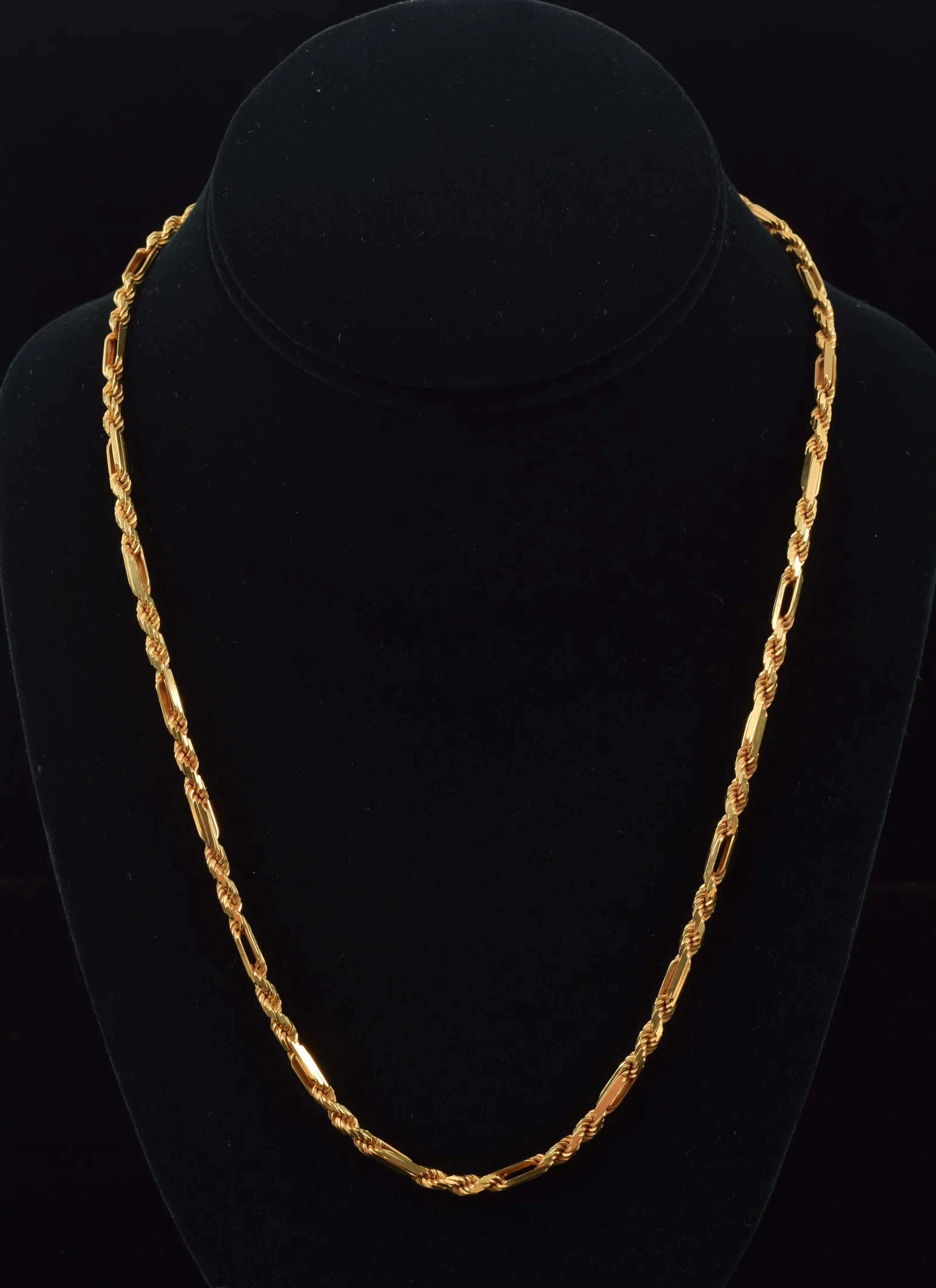 14K gold chain necklace. Heavy rope twist design with elongated spacers.
