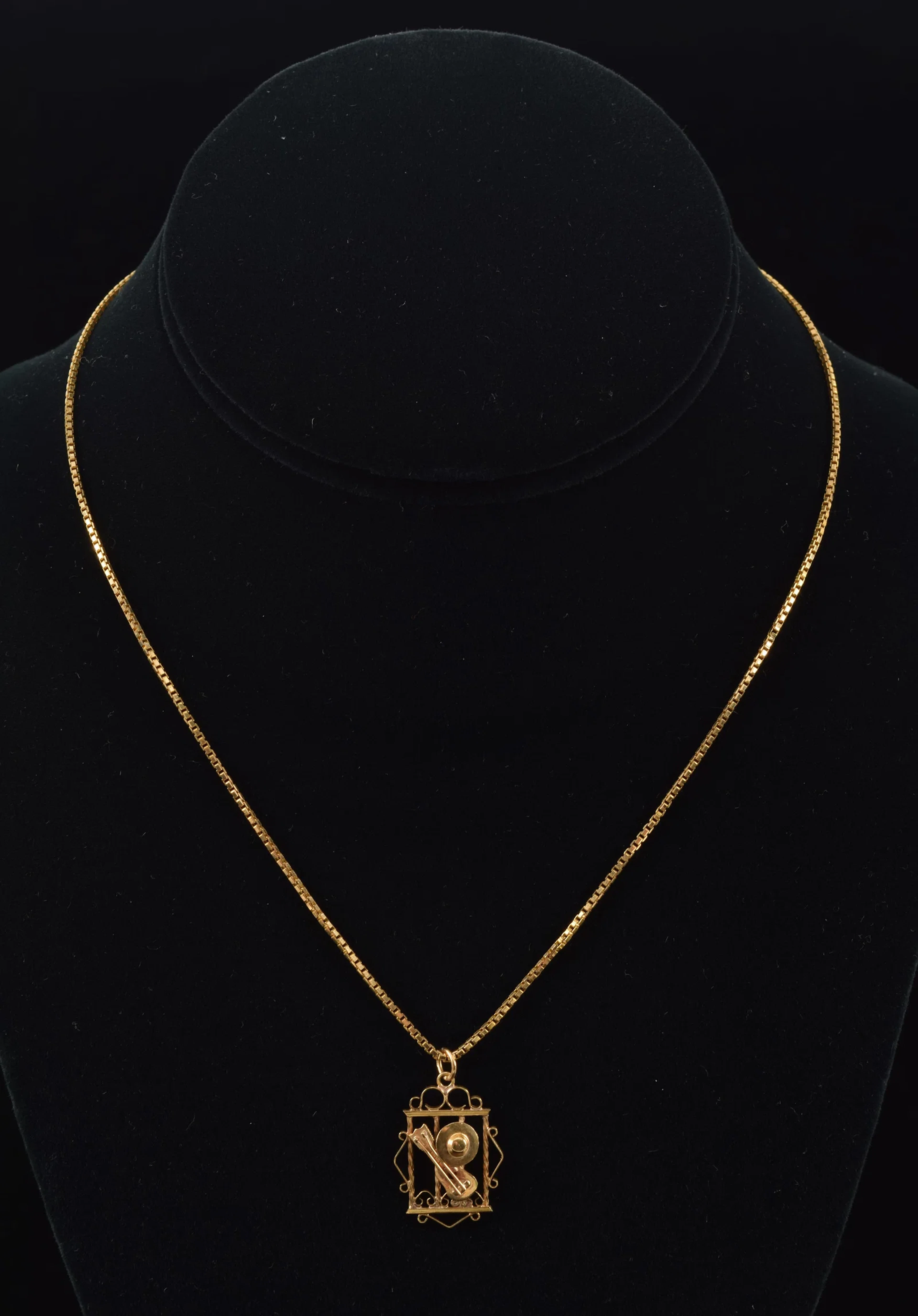 18K gold box link chain necklace and pendant. Openwork pendant with