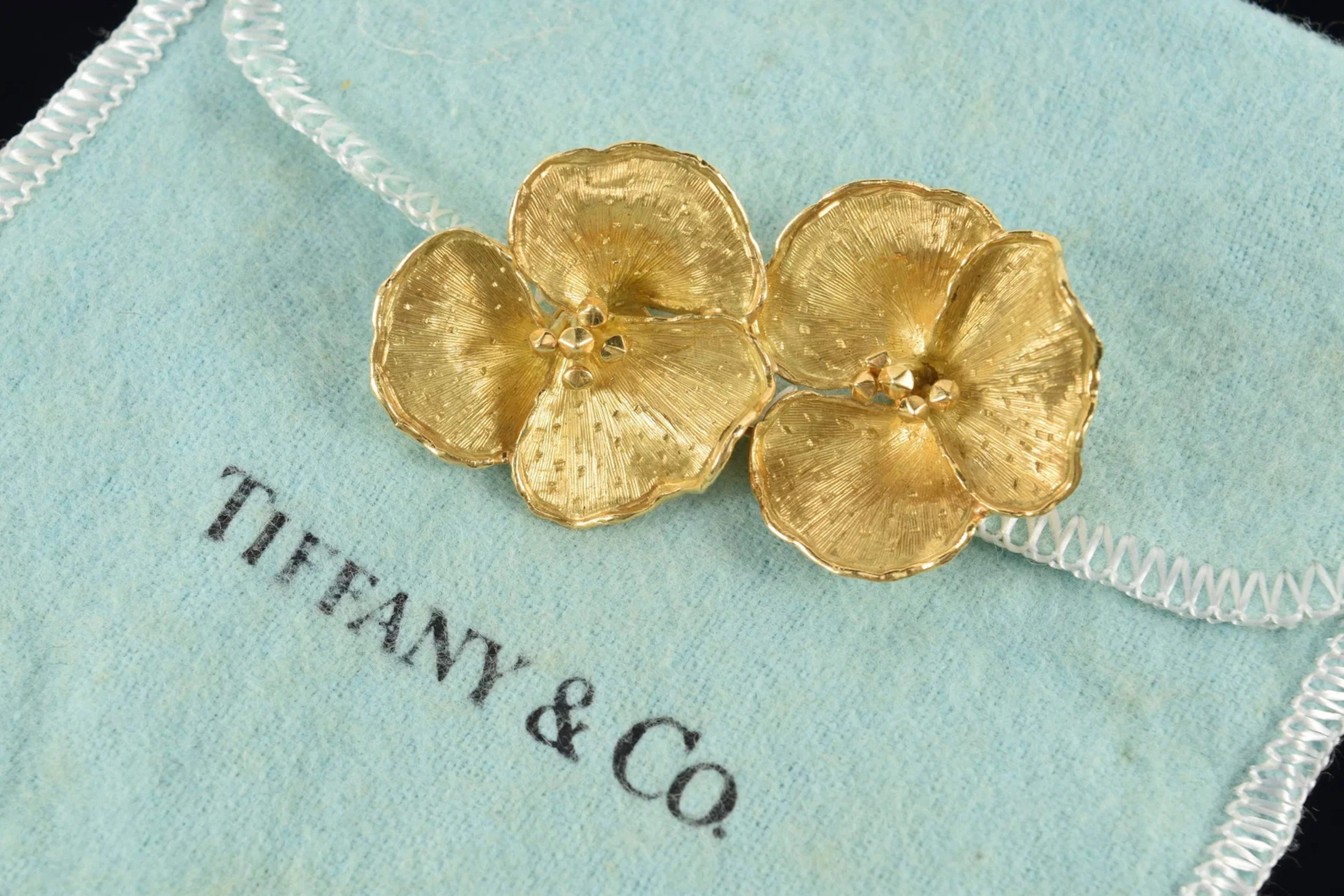 18K gold Tiffany & Co. floral pin. Etched markings on reverse of each