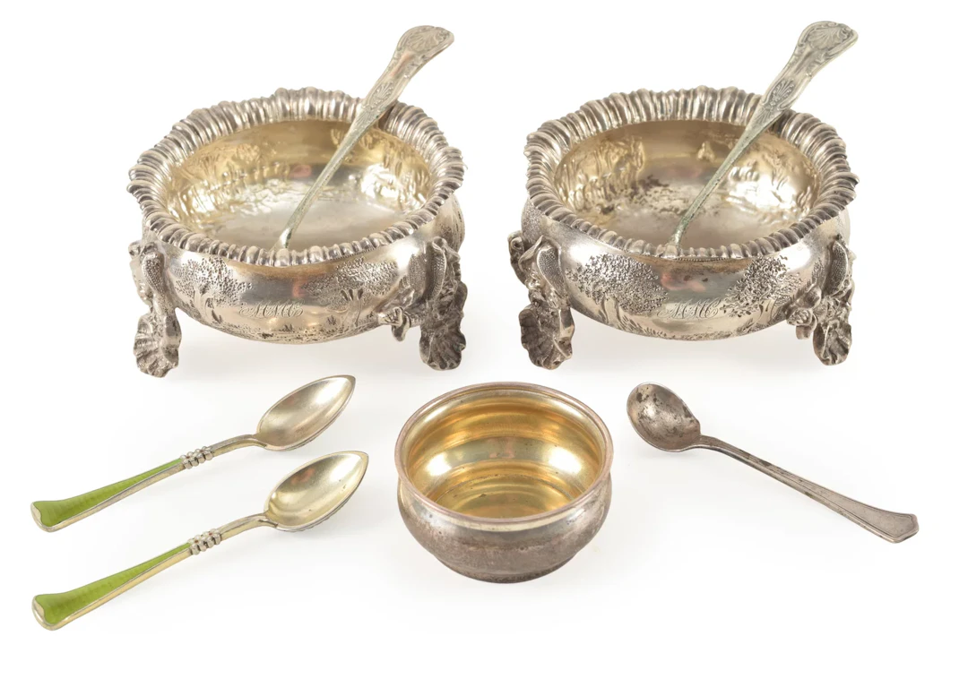 Pair of fine coin silver master salts with landscape decorations and
