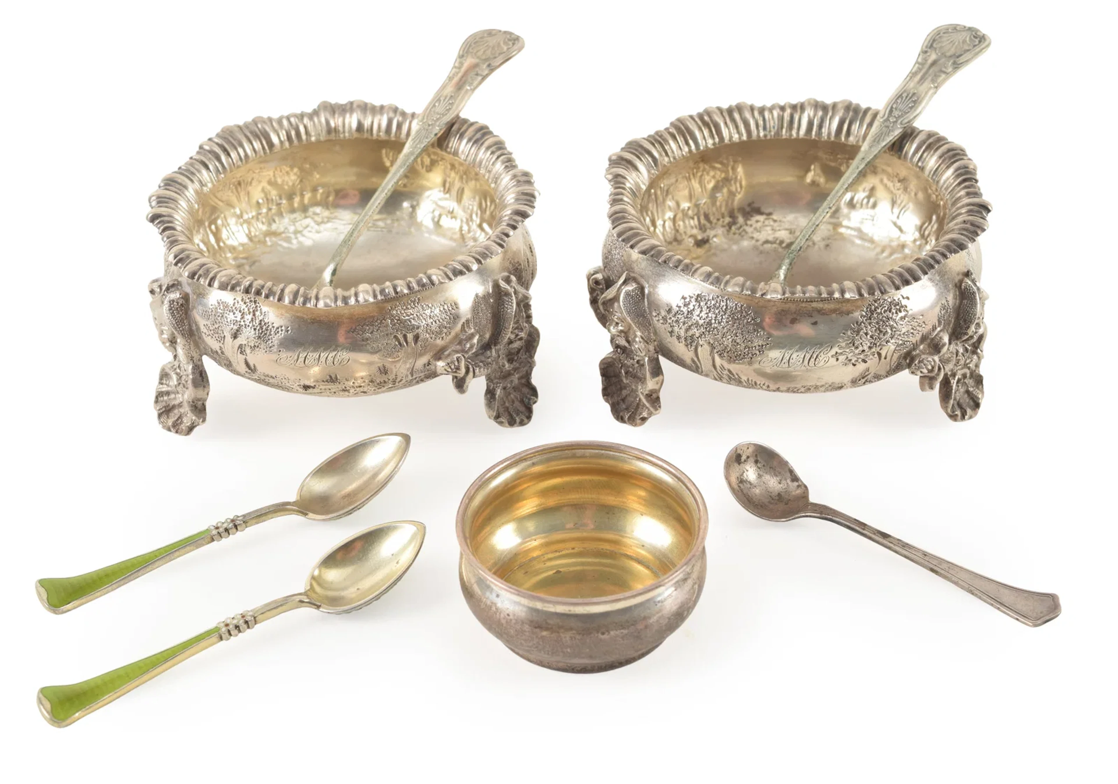 Pair of fine coin silver master salts with landscape decorations and