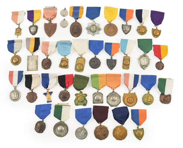 Collection of 37 vintage fencing medals, including some silver. Backsides