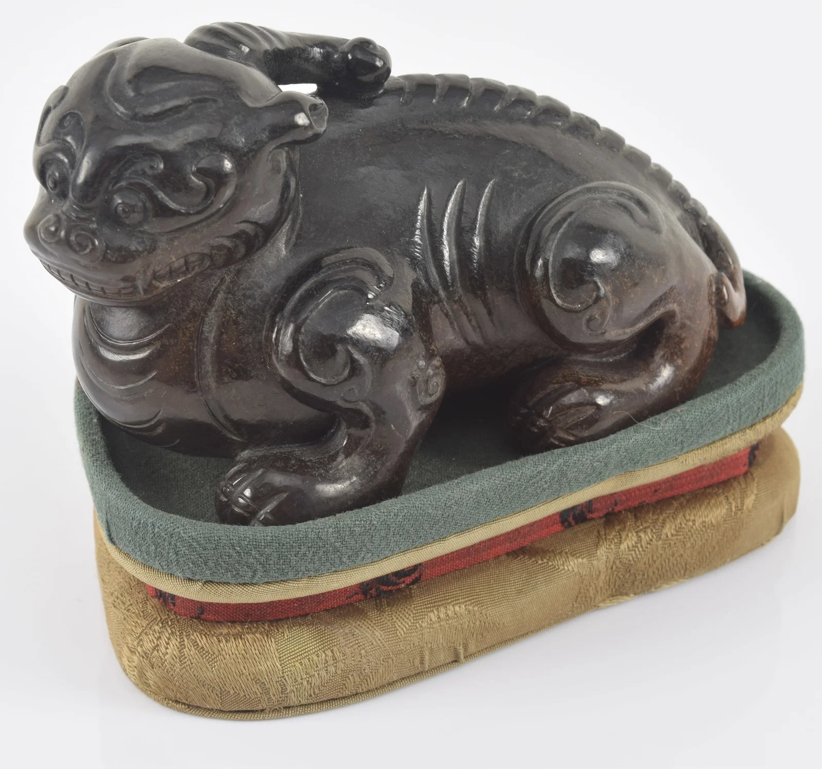 Jade luodan. China. Ming period (1368-1644). Fitted cloth stand. 4.25
