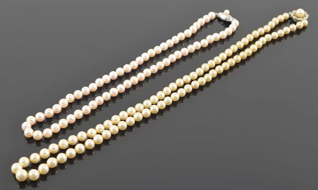 2 silver clasped pearl necklaces. Pearl diameters for each necklace